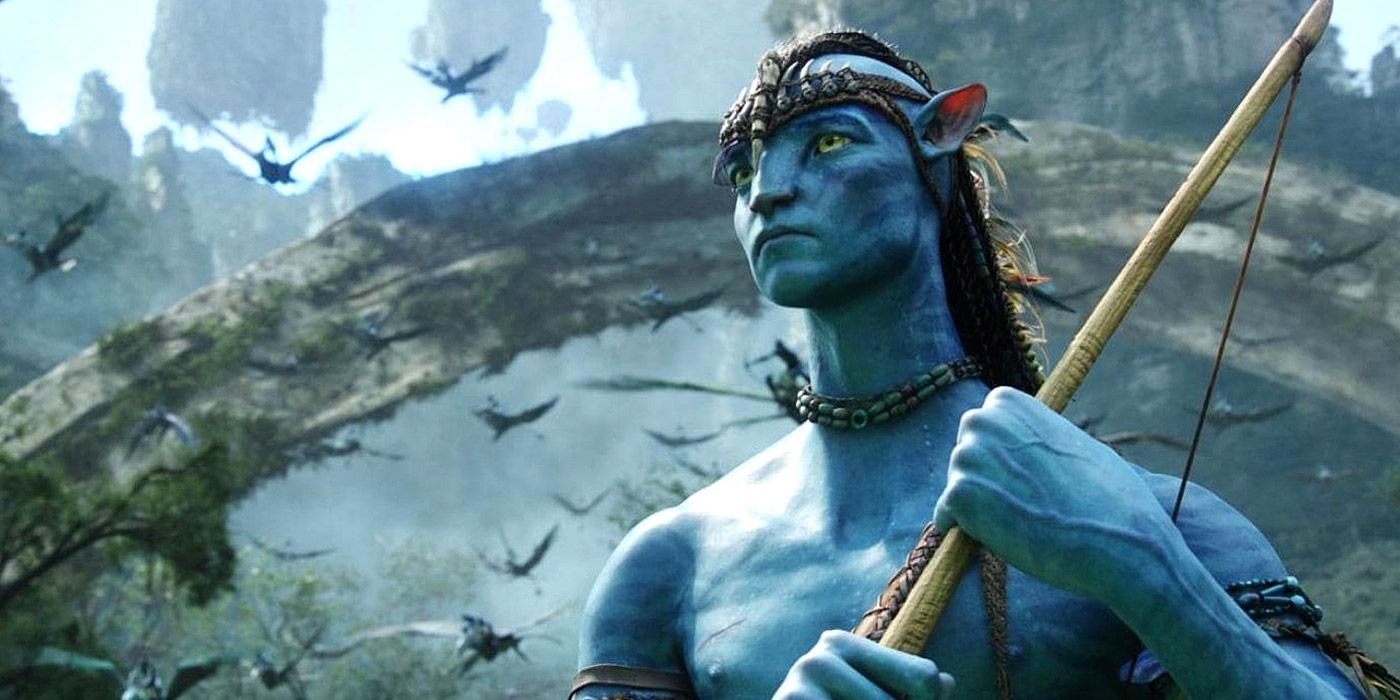 A Na'vi warrior stands with a bow in Avatar.