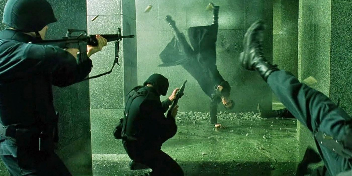 Neo attacks a group of security personnel in The Matrix