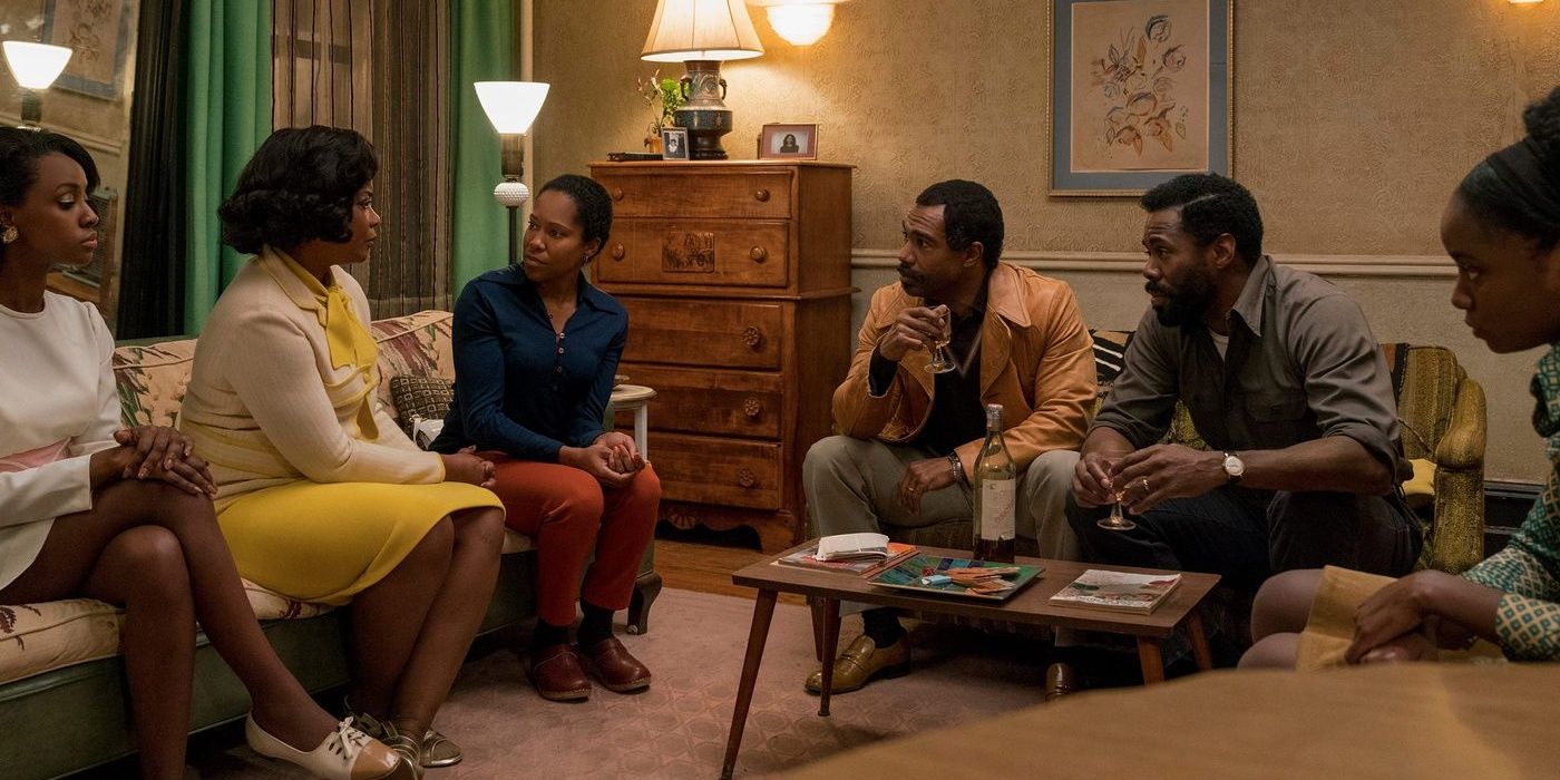 Tish and Fonny's families in the living room in If Beale Street Could Talk