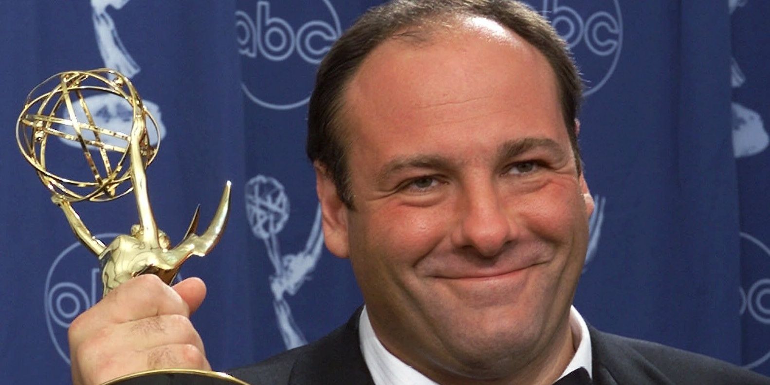 James Gandolfini poses for photos with his award at the The 52nd Annual Primetime Emmy Awards