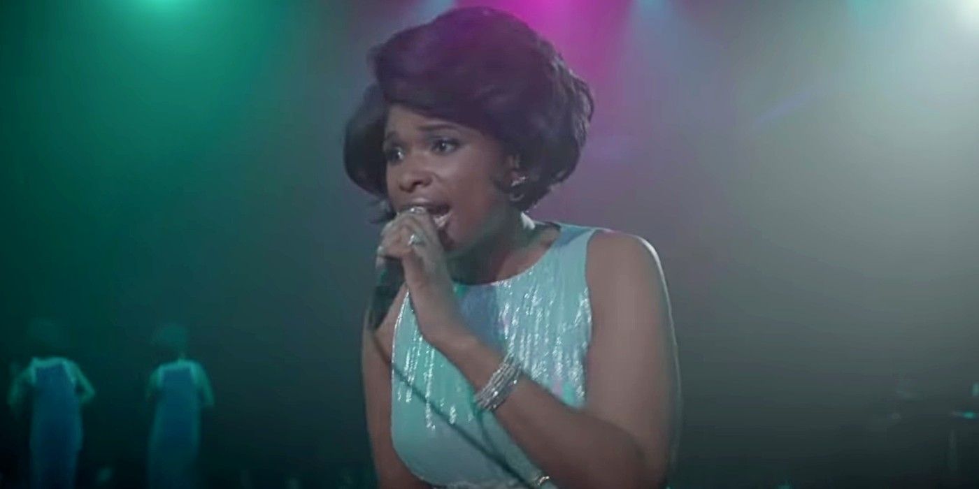 Jennifer Hudson singing into a microphone in Respect