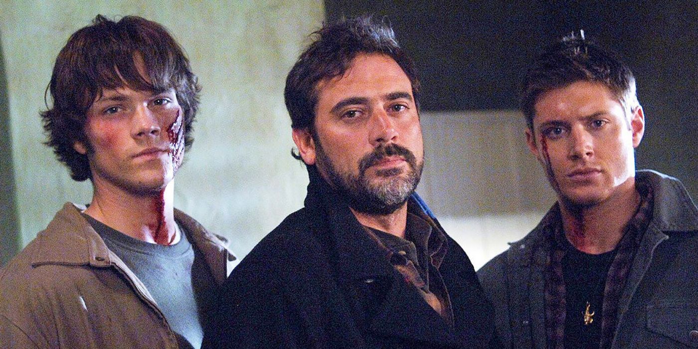 John Winchester with Sam and Dean in Supernatural.