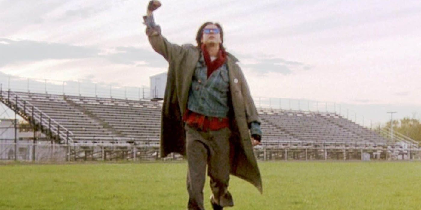 Judd Nelson holding fist up at end of Breakfast Club.