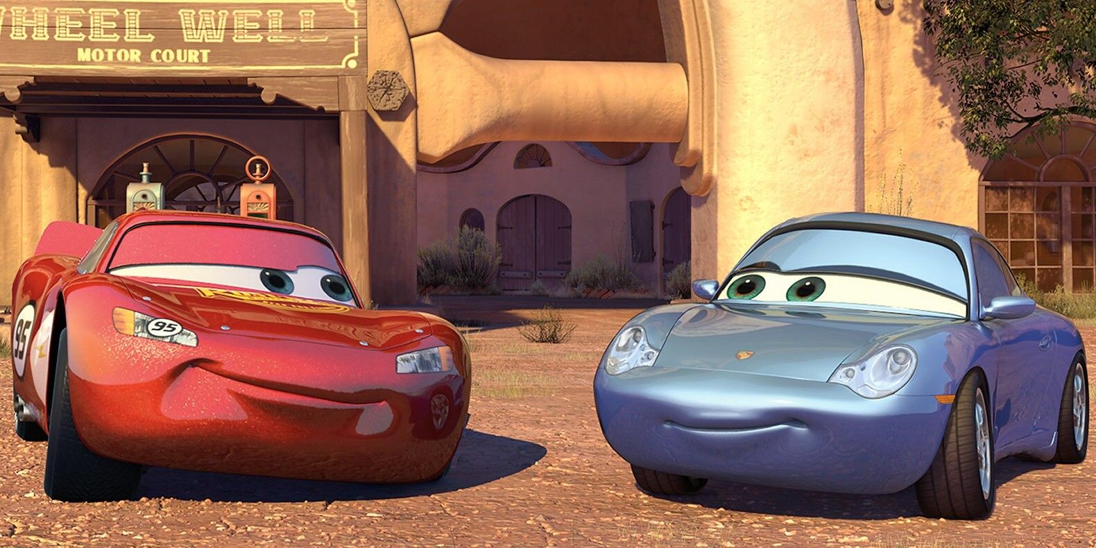 Lightning McQueen and Sally smile together in Pixar's Cars