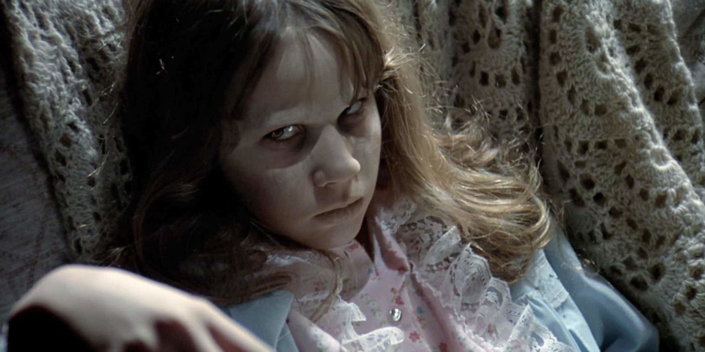 A possessed Linda Blair looks at the camera in The Exorcist.