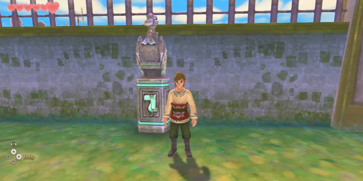 Link standing in front of a bird statue in Skyward Sword