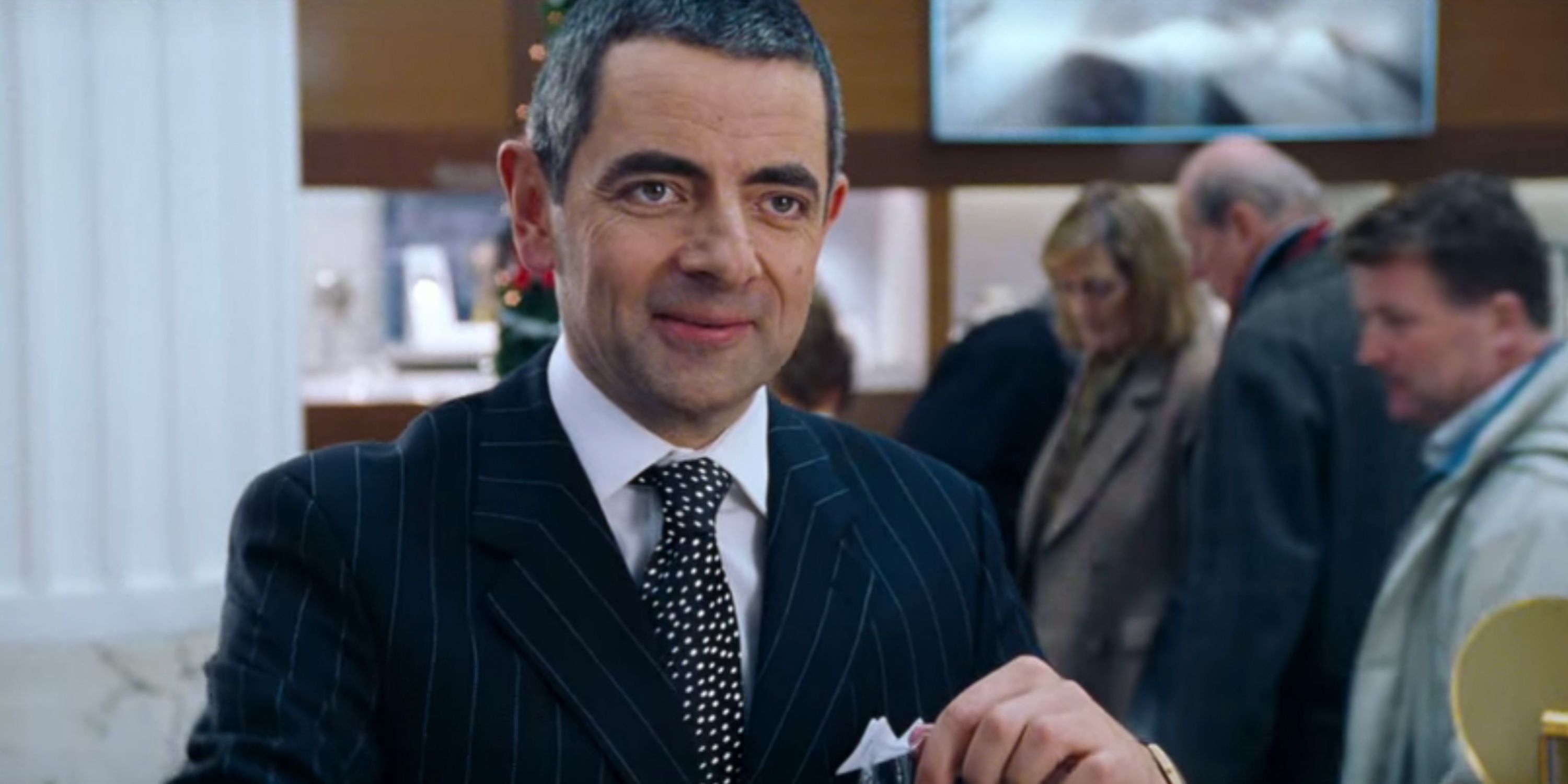 Rowan Atkinson as Rufus in Love Actually