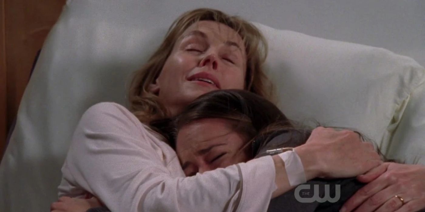 Lydia holding Haley as they lie in bed together on One Tree Hill