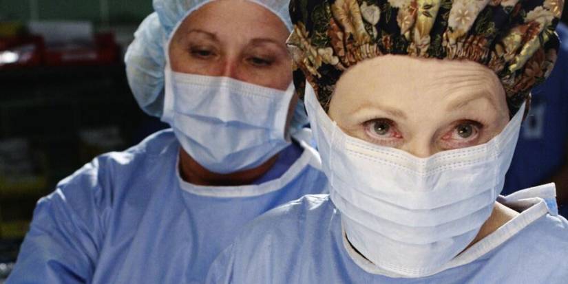 Margaret Campbell wears an enlarged scrub cap with a net to accommodate her extra hair in Grey's Anatomy