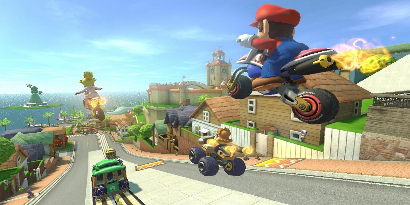 Mario racing on a bike in Mario Kart 8.