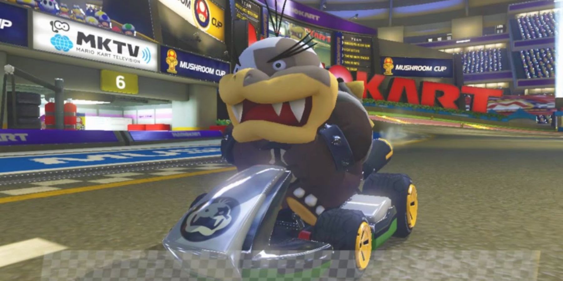 Morton mengemudi dalam balapan Mario Kart