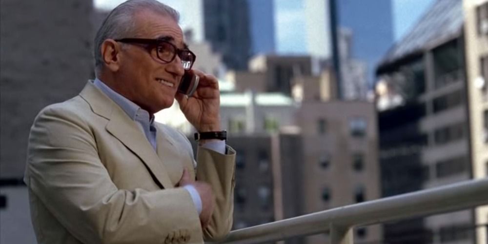 Martin Scorsese talks on the phone outside in Entourage