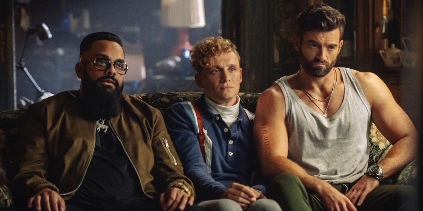 Rolf, Ludwig, and Brad sitting on a couch in Army of Thieves