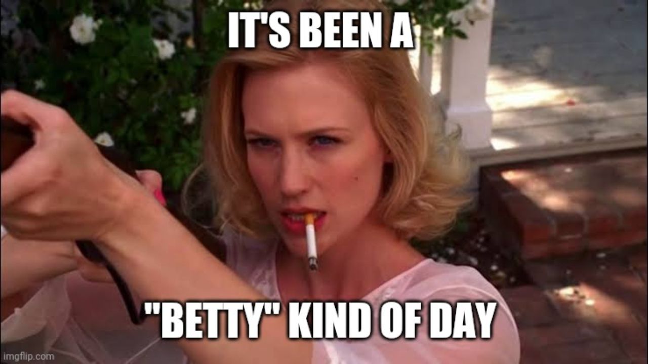 Meme featuring Betty Draper smoking a cigarette and holding a BB gun
