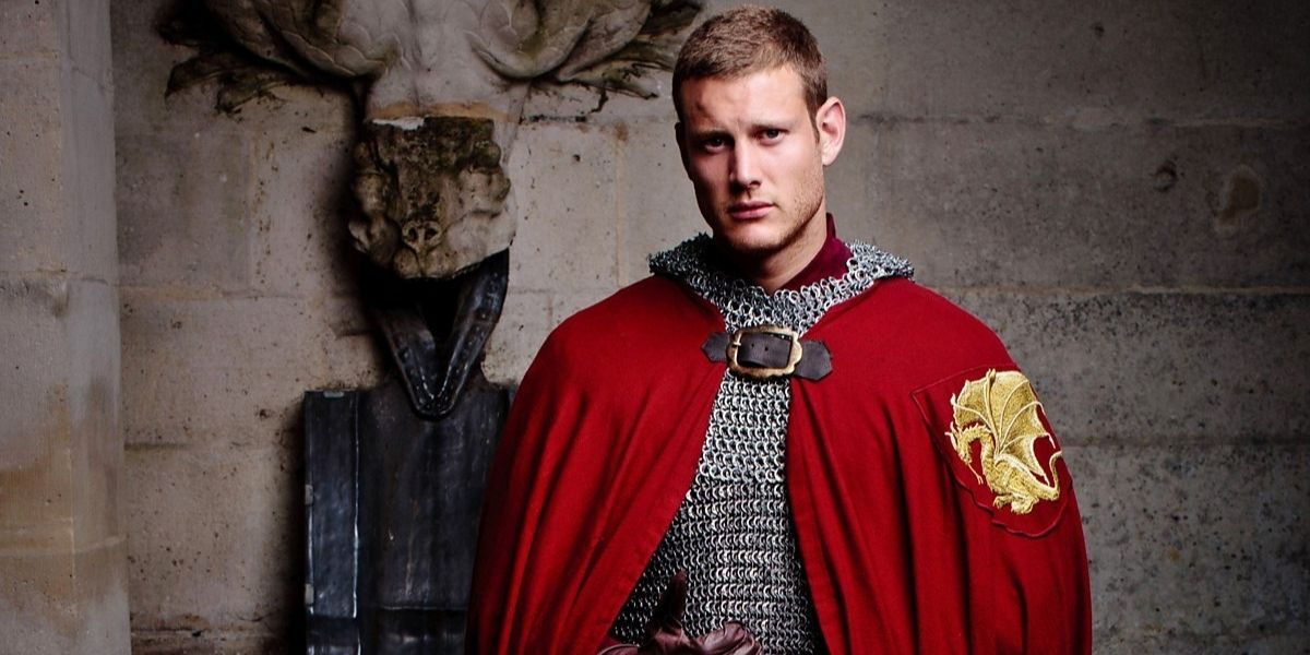 Percival wearing his Camelot cloak and posing