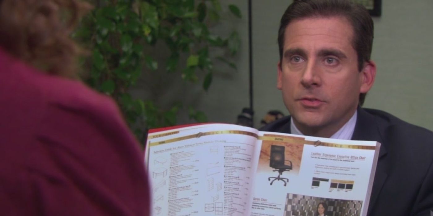 Michael Scott showing off a chair model in a magazine on The Office