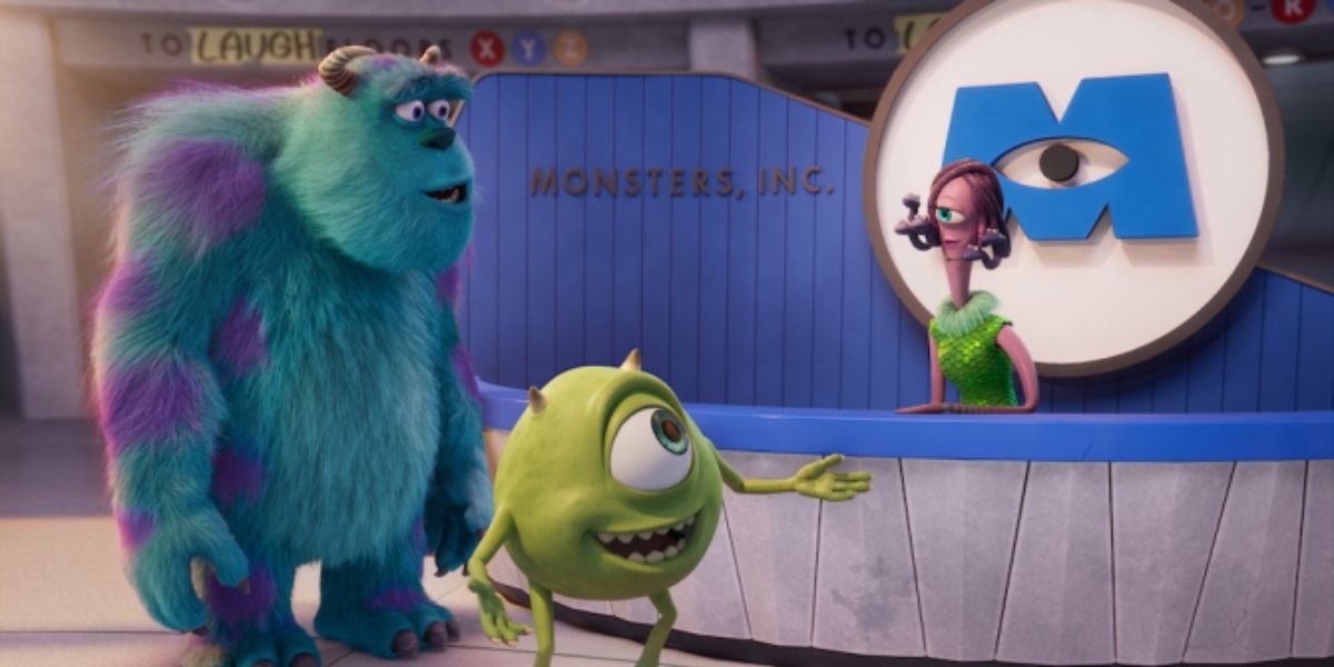 Mike and Sulley talking to Cilia at the reception