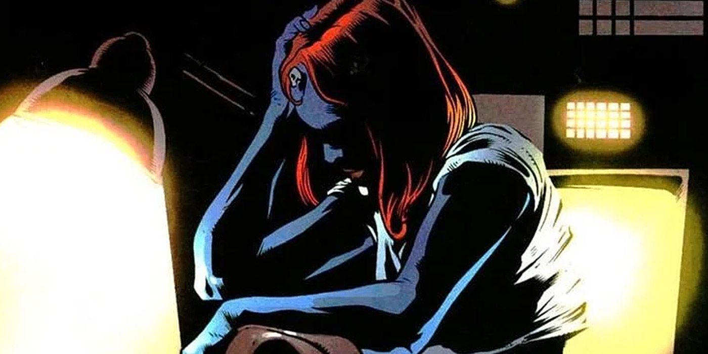 Mystique sitting alone in a dark room in the comics.