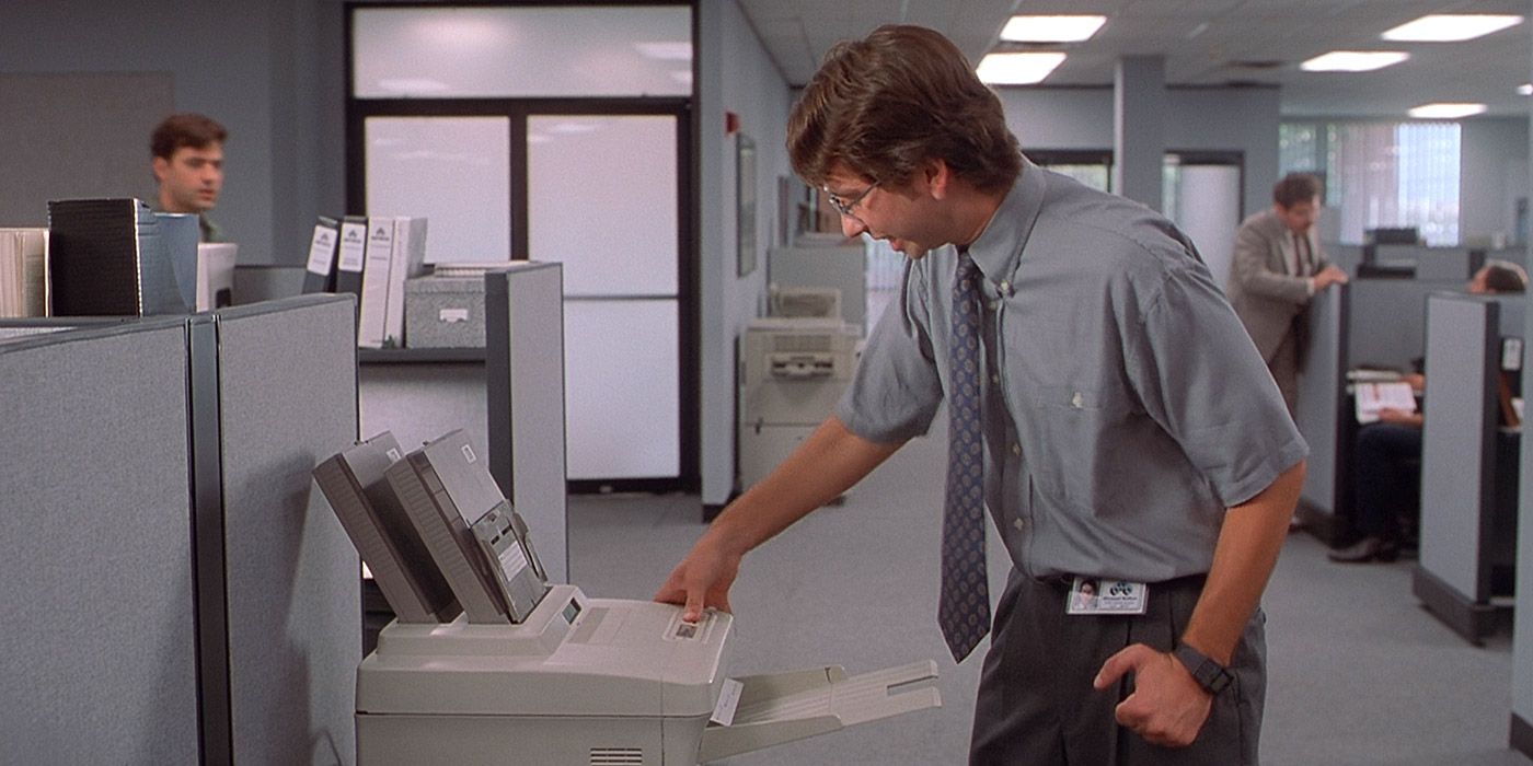 Michael fights with a printer in Office Space.