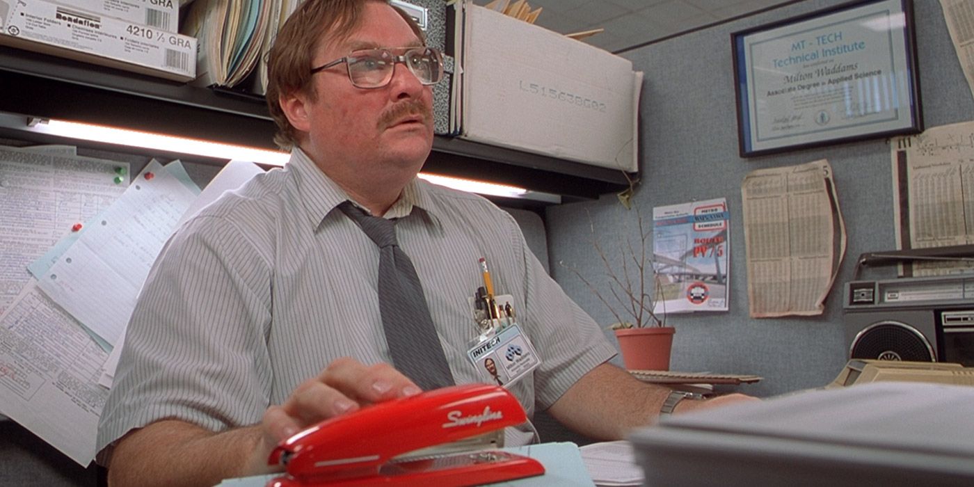 Milton guards his red Swingline stapler in Office Space
