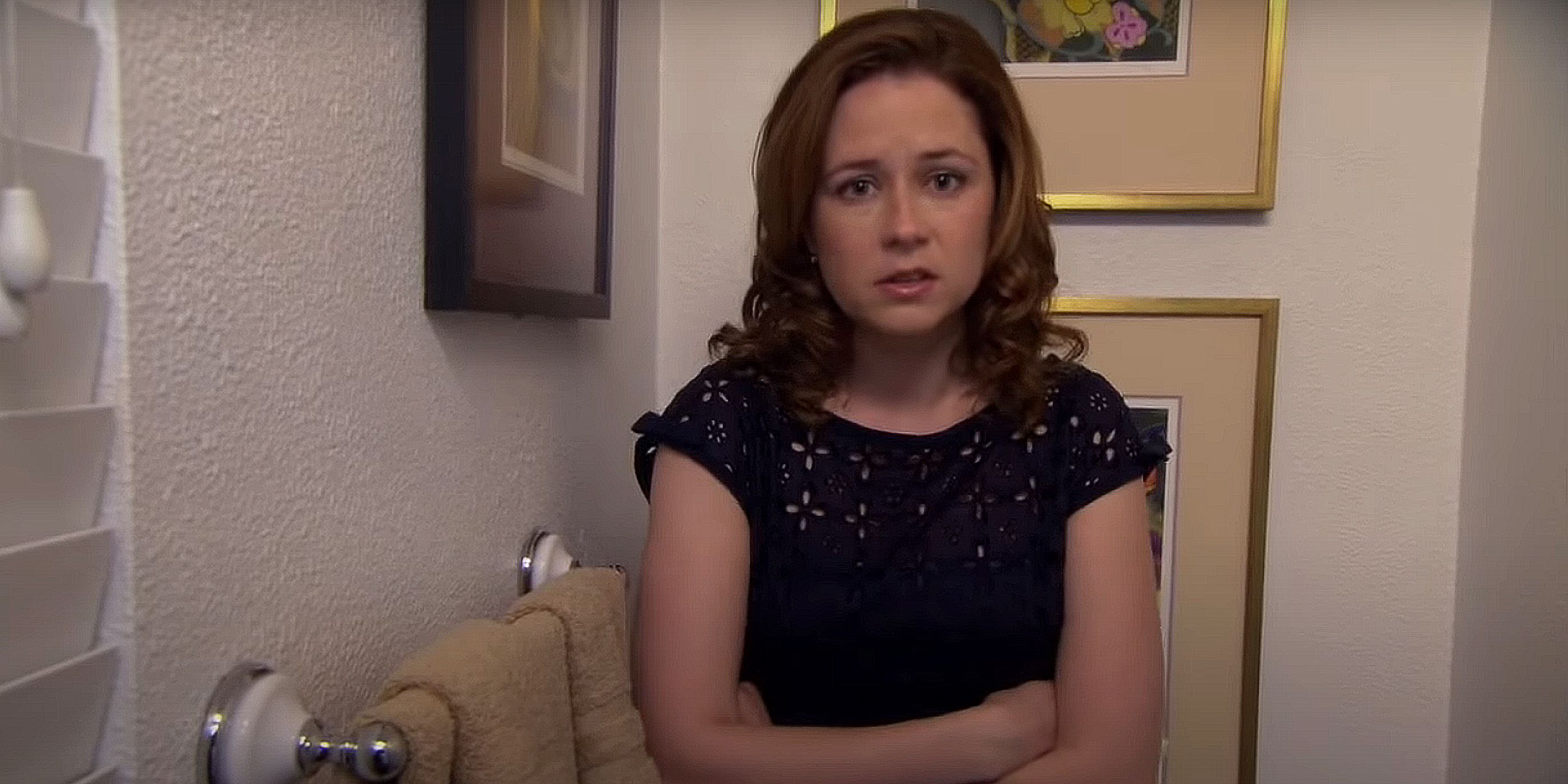 Pam hides in the bathroom at the dinner party in The Office.
