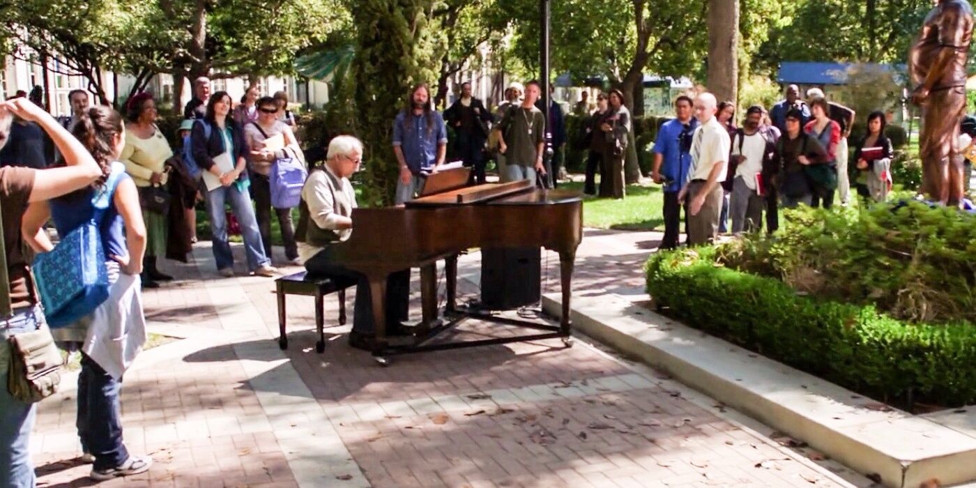 Pierce (Chevy Chase) playing piano and singing Greendale anthem in Community