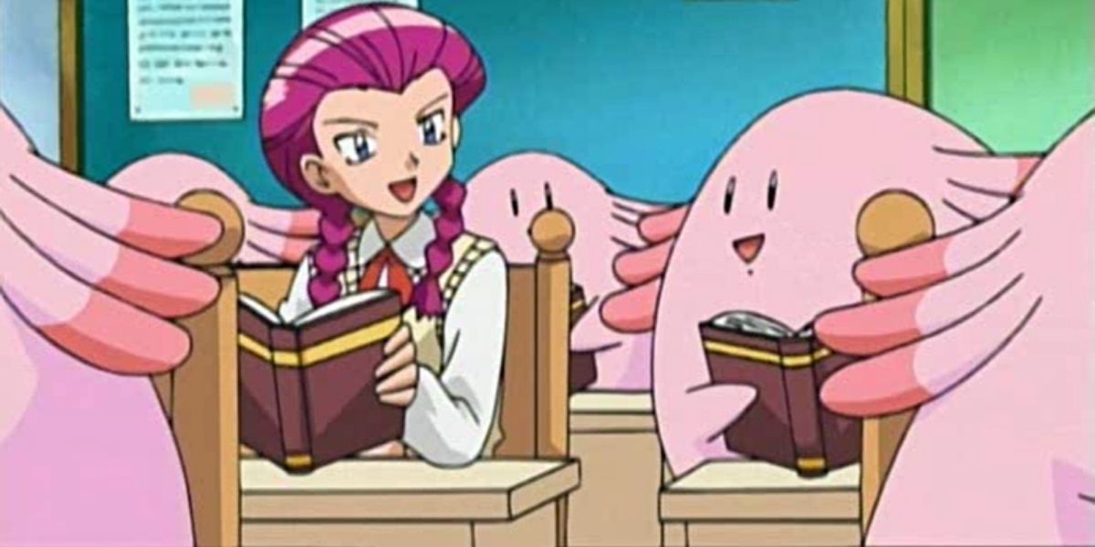 Young Jessie reading a book and smiling at Chansey