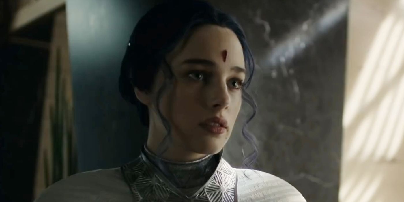 Raven gazes in the distance in her new white costume in Titans.