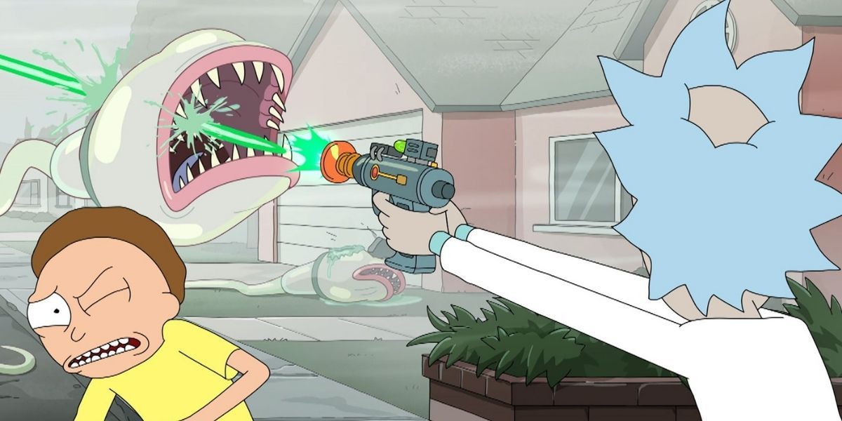 Morty shrieks while Rick shoots at a monster in Rick & Morty