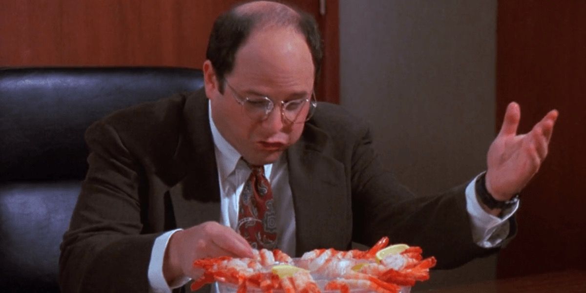 Seinfeld George eating shrimp in the office