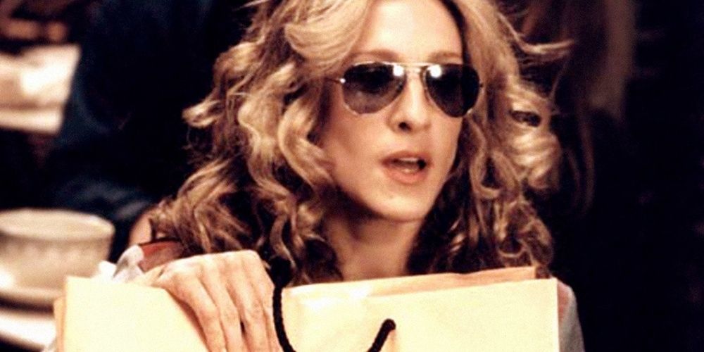 Carrie Bradshaw holds a shopping bag in Sex and the City