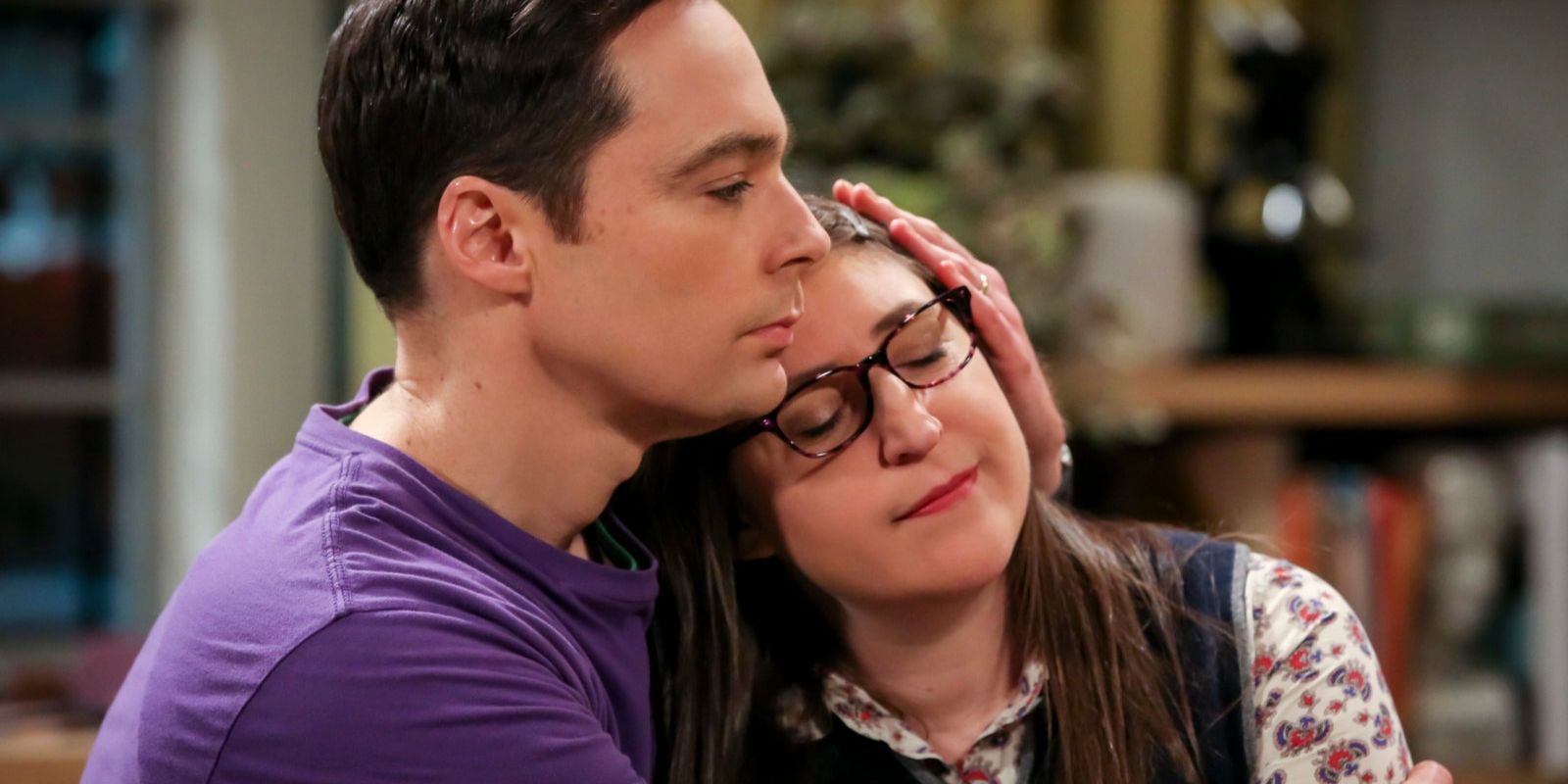 Amy resting her head on Sheldon's shoulder in TBBT