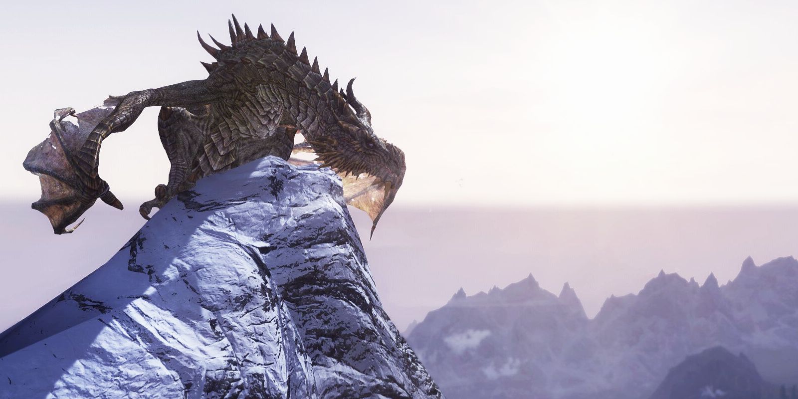 Skyrim’s Paarthurnax perched atop the Thorat of the World