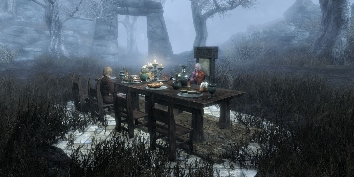 Two characters at a dinner table in the woods in Skyrim