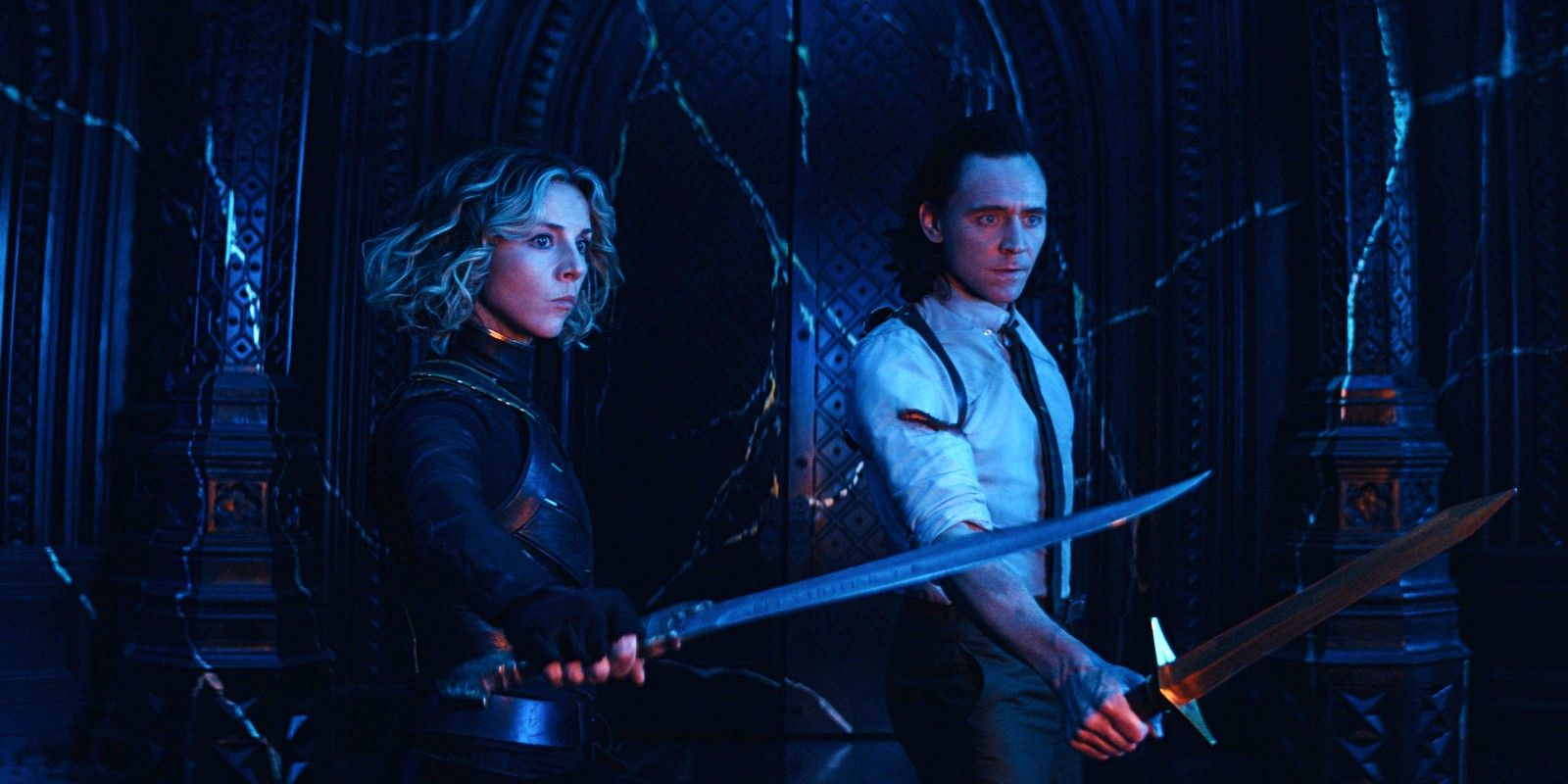 Loki and Sylvie hold up swords in Loki 