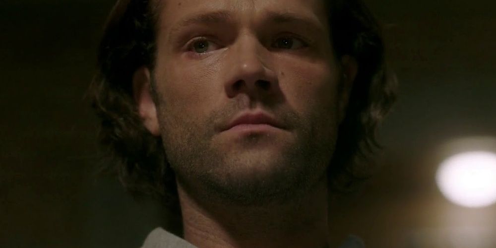 Sam Winchester tries not to cry in Supernatural.