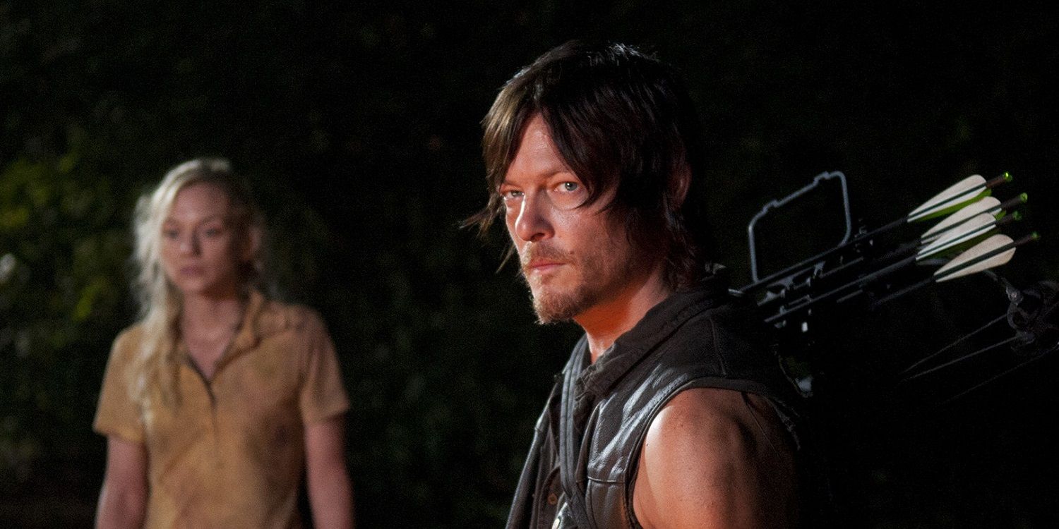 Daryl and Beth watching a house burn in The Walking Dead