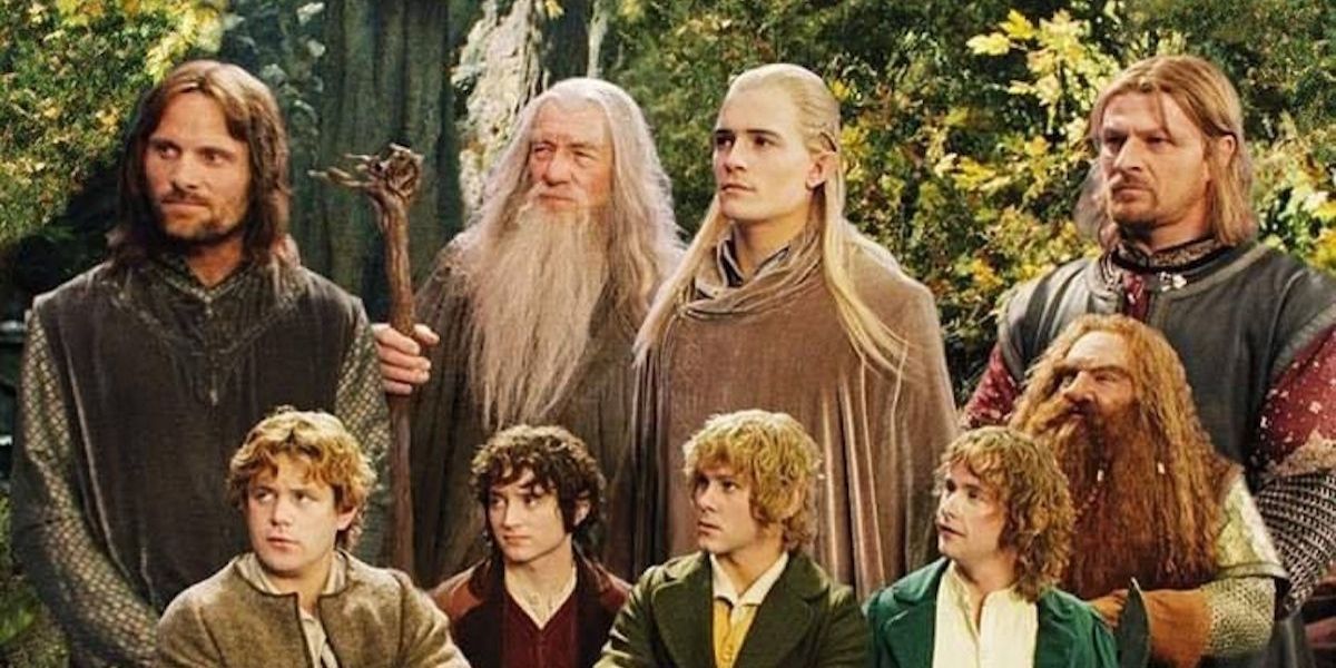 The Members Of The Fellowship Of The Ring standing together in The Lord of the Rings.