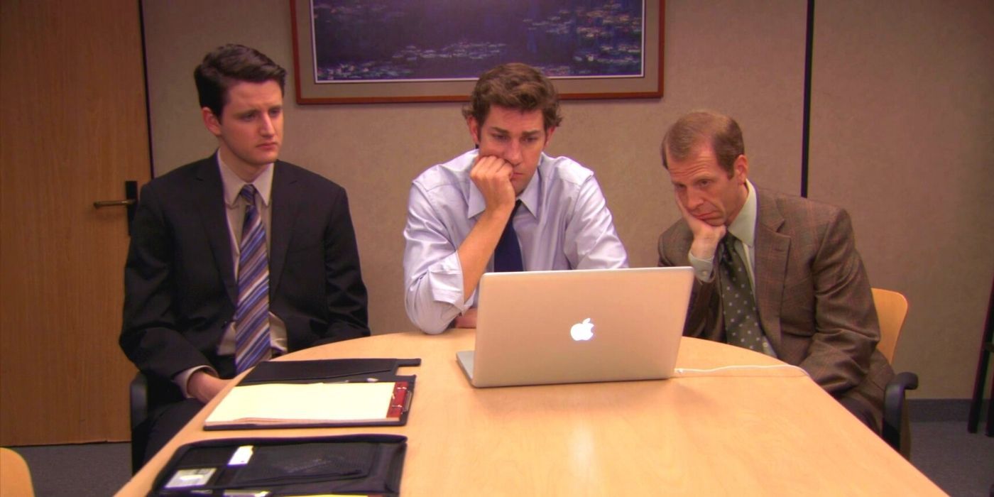 Toby, Jim, and Gabe looking at a computer on The Office