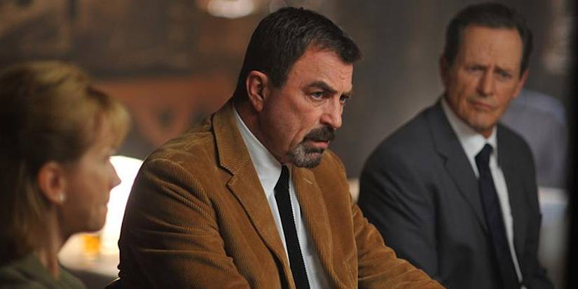 Tom Selleck as Jesse Stone in Lost in Paradise, sitting and looking upset
