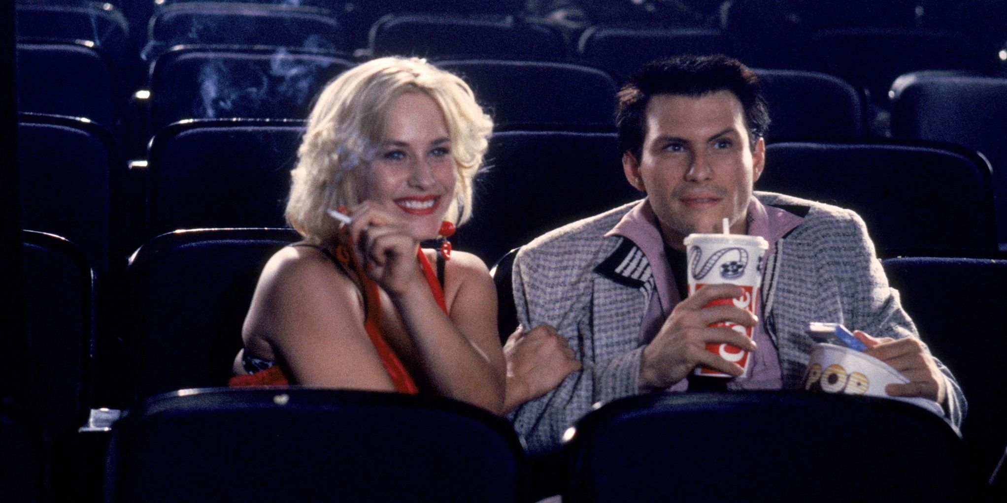 Christian Slater and Patricia Arquette in a movie theater in True Romance