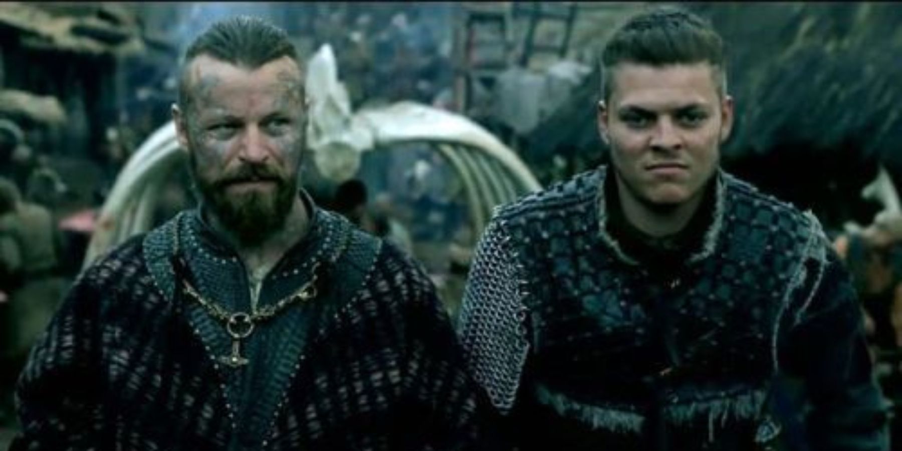 Harald and Ivar from Vikings looking determined and stern in outdoor scene.