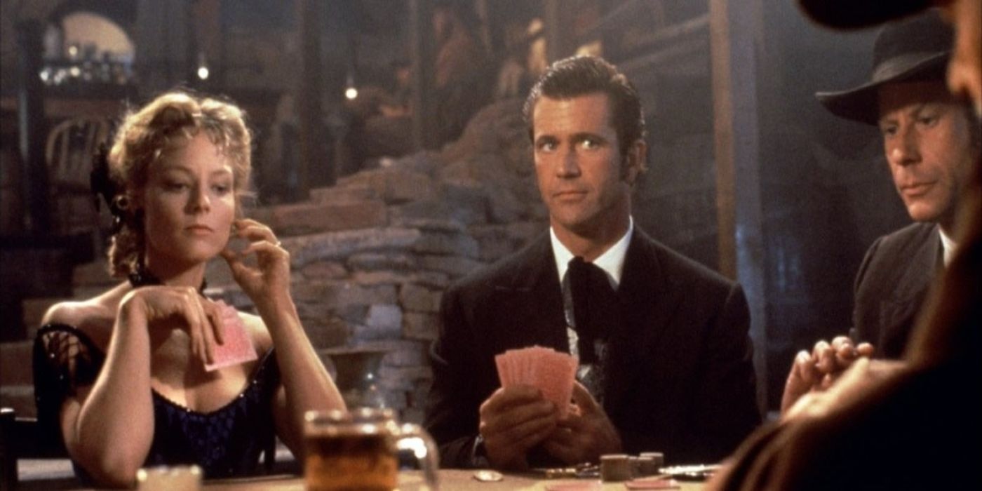 Mel Gibson and Jodie Foster playing cards in Maverick 1994