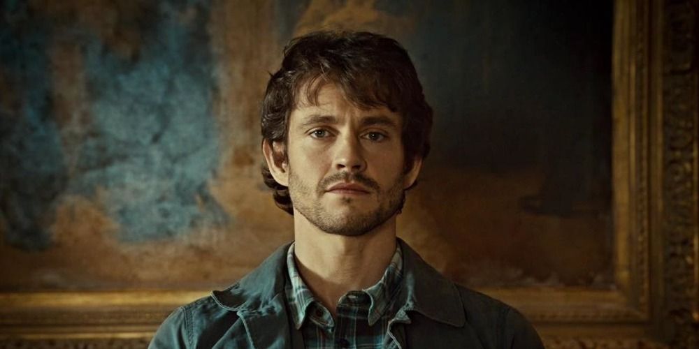 Will Graham standing in front of an elaborate painting in Hannibal