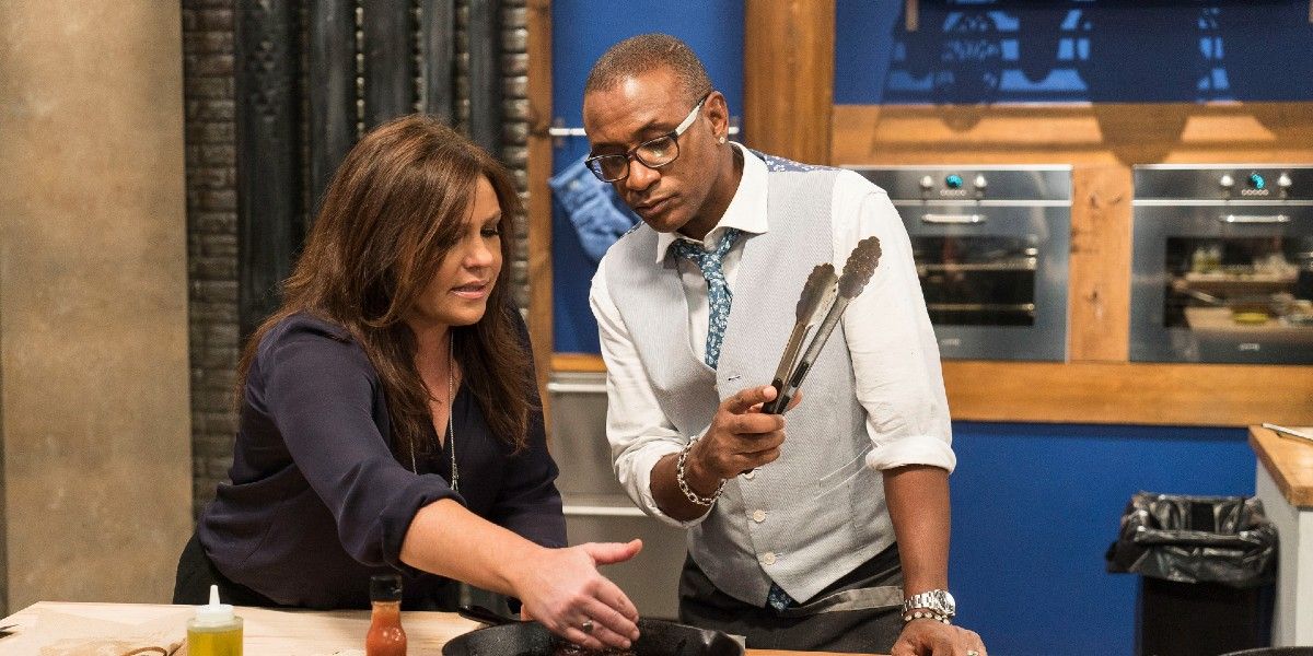 Rachael Ray on Food Network's 'Worst Cooks in America' helping a contestant in the kitchen.