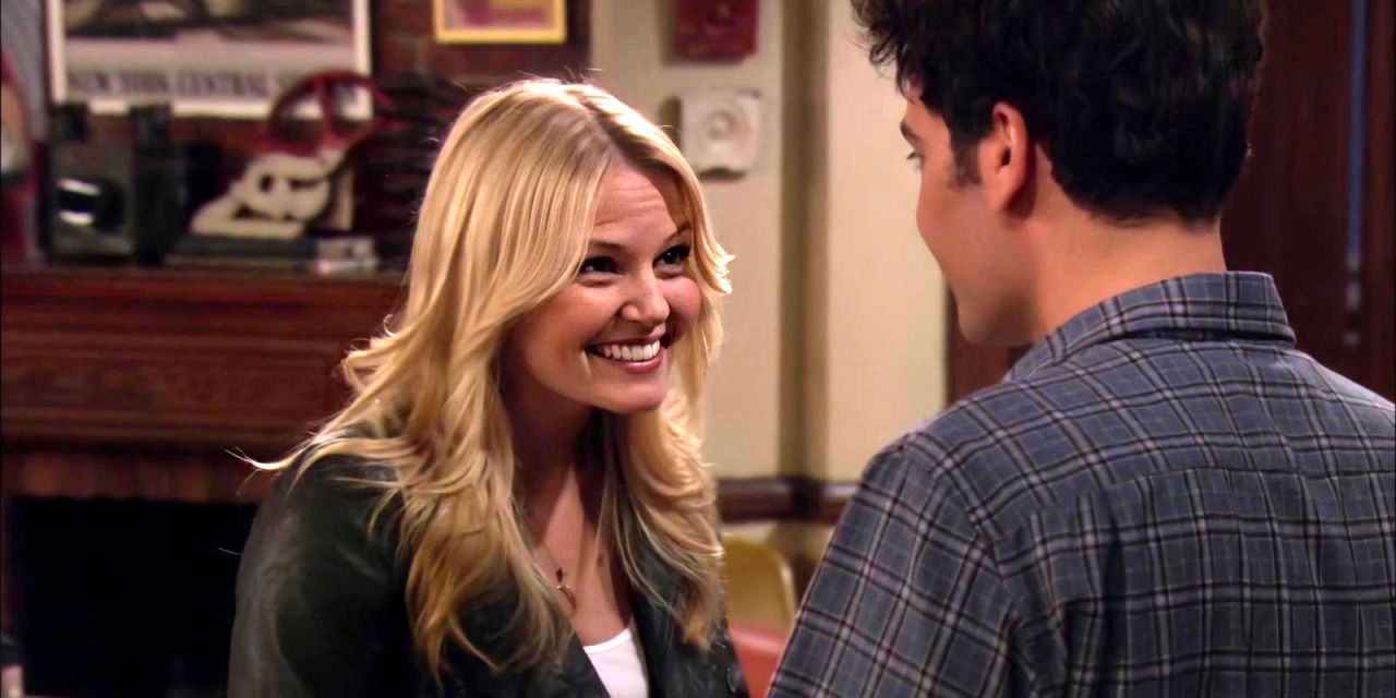 Zoey smiling at Ted in How I Met Your Mother.