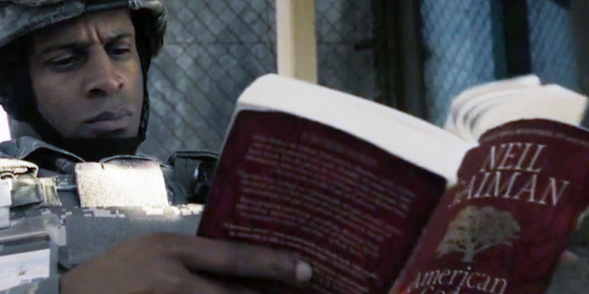 A soldier reads Gaiman's American Gods in Good Omens.