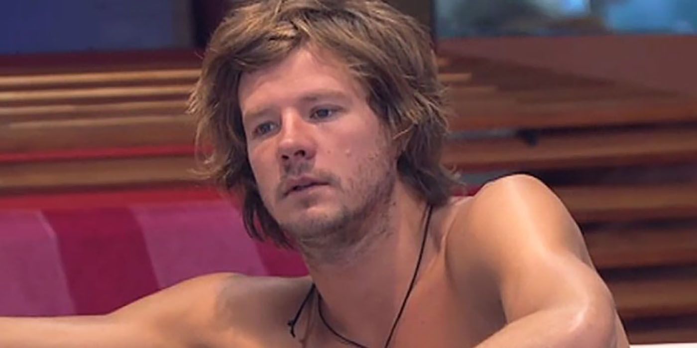 Josh Moore from Big Brother Australia, sitting outside with his shirt off.