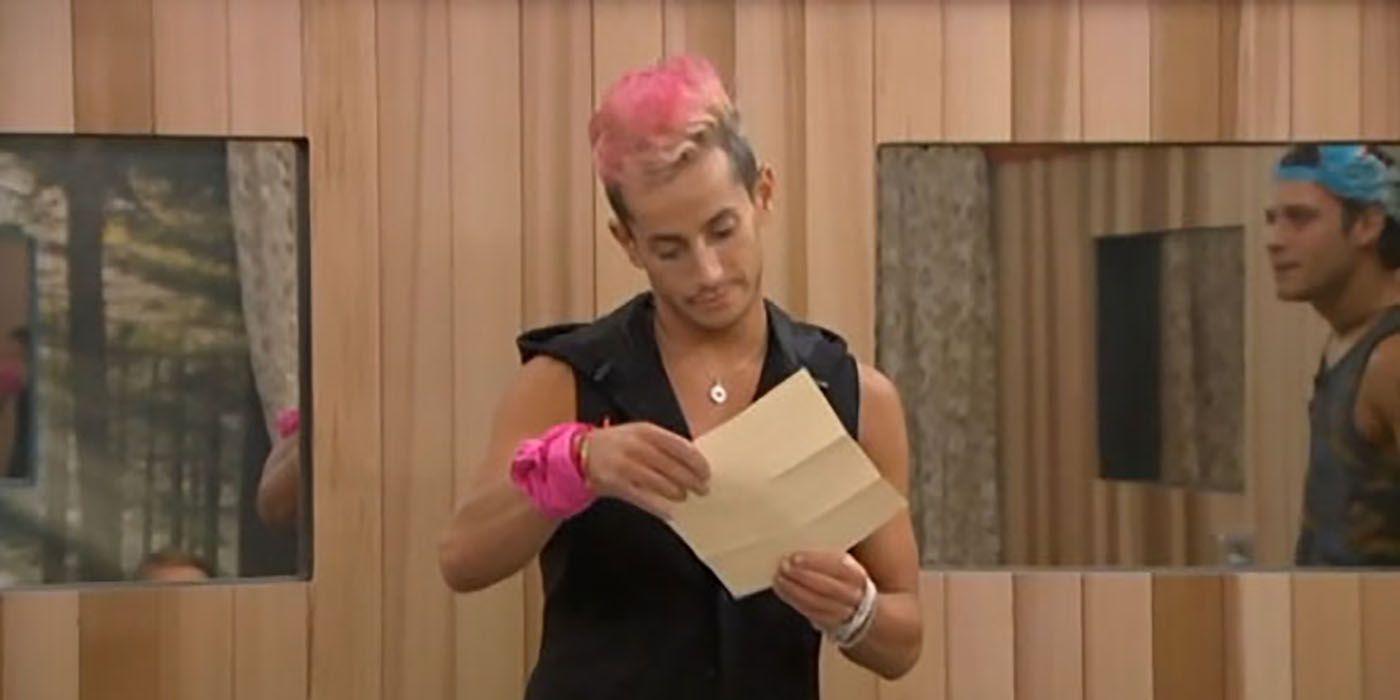 Frankie from Big Brother reading a letter from home.