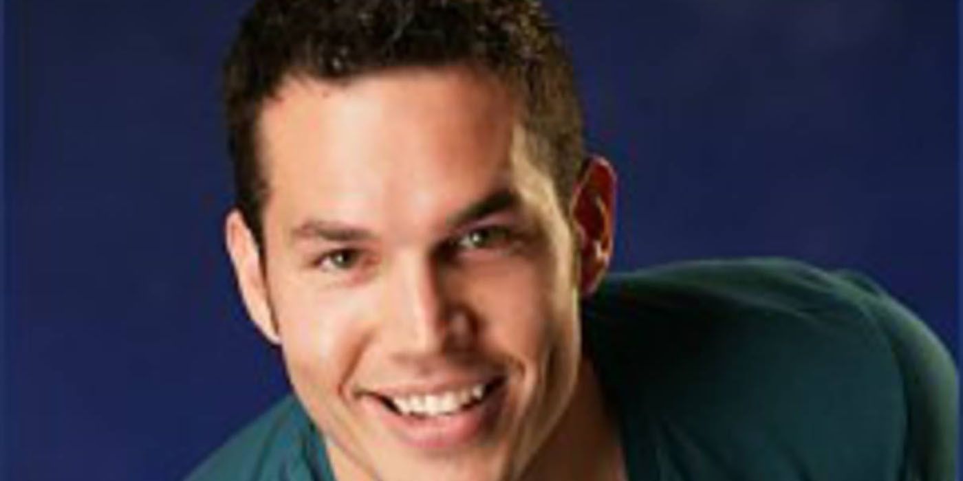A headshot of Neil Garcia from Big Brother, smiling.
